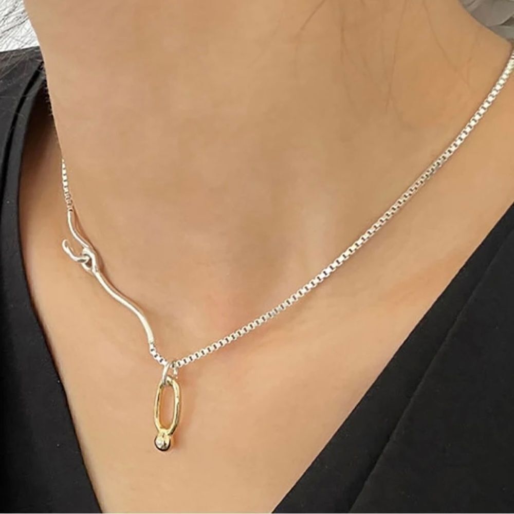 The Asymmetry Two Tone Abstract necklace in 925 silver.